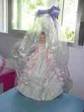 Muñeca con vestido de papel