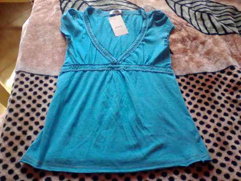 Blusa talla m (es estrecha)