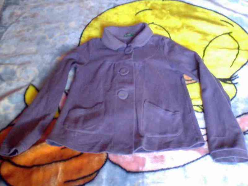 Chaquetita violeta talla 8 (no envío)