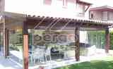 Porche de madera acrisolado en pergoglass