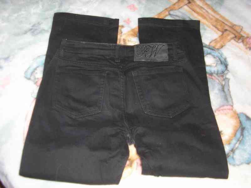 Pantalón negro talla 38 (max. 1,65 cm)