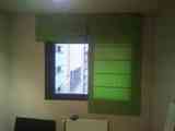 2 estores verdes