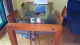 Mesa extensible cristal y madera. Con desperfectos en las pat