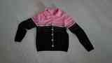 Chaqueta de punto negra y rosa. Talla L (recicleo)