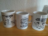 Tres tazas con dibujos de Forges