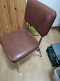 4 sillas de cuero