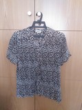 Blusa plisada