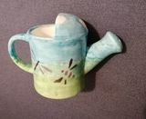 Regadera pequeña de cerámica