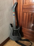 Regalo guitarra Guitar Hero + juego