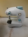 Máquina de coser portátil 