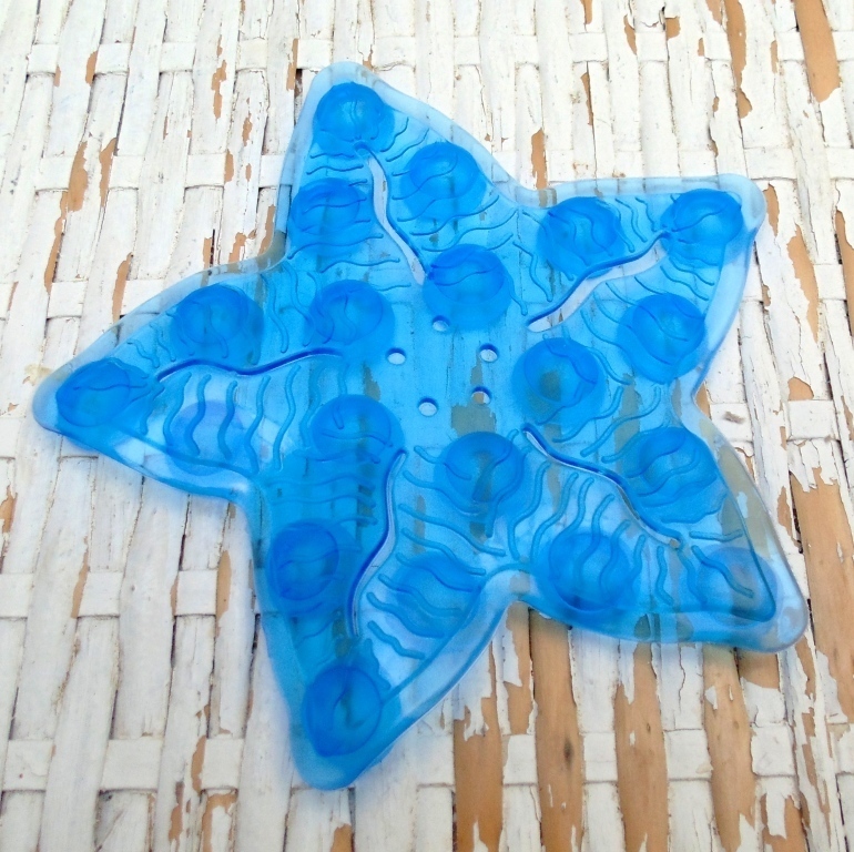 Estrella antideslizante para ducha (usada, con poco color azul)