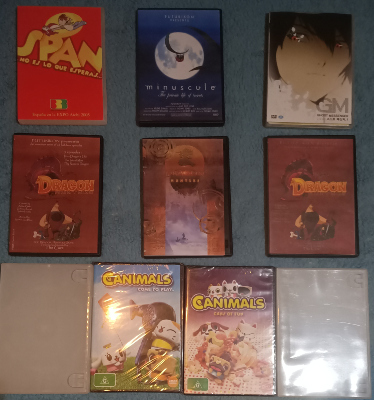 Lote de 8 videos animados en DVD y 2 carátulas vacías.