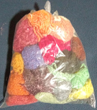 Lote de rollos de lana de colorines.