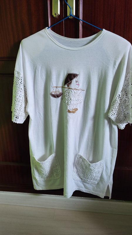 Blusón con bolsillos de manga corta. Talla xl(anitaana)