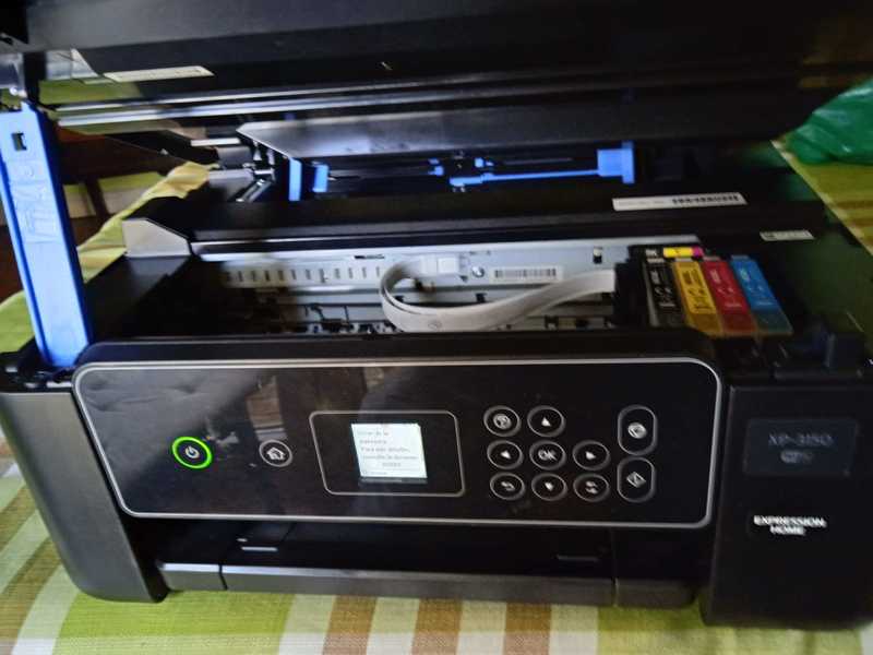 Impresora Epson XP 3150, se enciende pero da error 033001