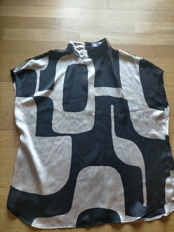 Blusa sin mangas talla M raso