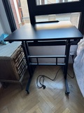Mesa ajustable para trabajo sentado y de pie